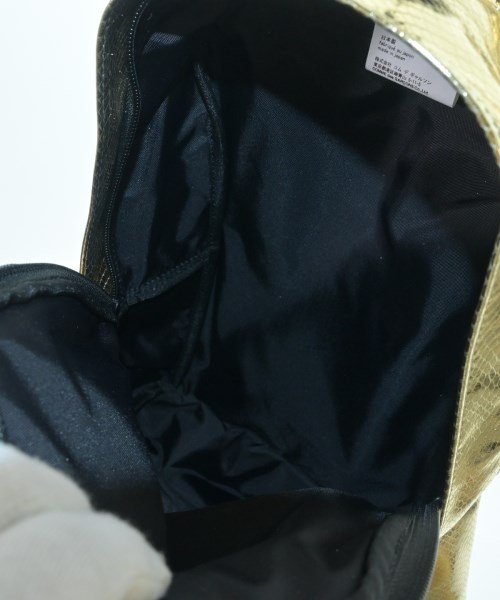 COMME des GARCONS（コムデギャルソン）バックパック・リュック ゴールド サイズ:- レディース/2200696811036