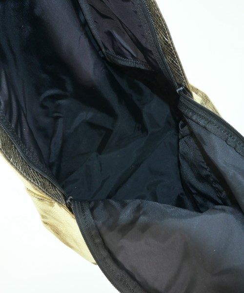 COMME des GARCONS（コムデギャルソン）バックパック・リュック ゴールド サイズ:- レディース/2200670247417