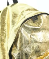 COMME des GARCONS（コムデギャルソン）バックパック・リュック ゴールド サイズ:- レディース/2200670247417
