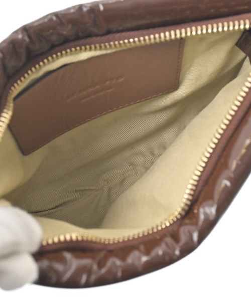 REJINA PYO（レジーナ　ピョウ）ポーチ 茶 サイズ:- レディース/2200644603645
