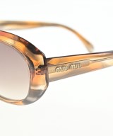 Miu Miu（ミュウミュウ）サングラス オレンジ サイズ:- レディース/2200640474034