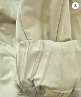 PLEATS PLEASE（プリーツプリーズ）ダウンコート ベージュ サイズ:F レディース/2200664193010