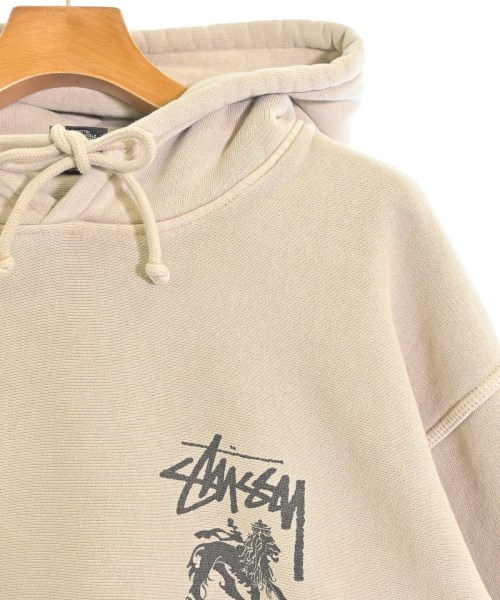 STUSSY（ステューシー）パーカー ベージュ サイズ:L メンズ/2200623242032