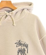 STUSSY（ステューシー）パーカー ベージュ サイズ:L メンズ/2200623242032