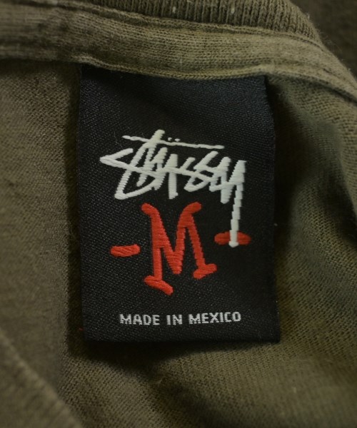 STUSSY（ステューシー）Tシャツ・カットソー カーキ サイズ:M メンズ/2200647513088