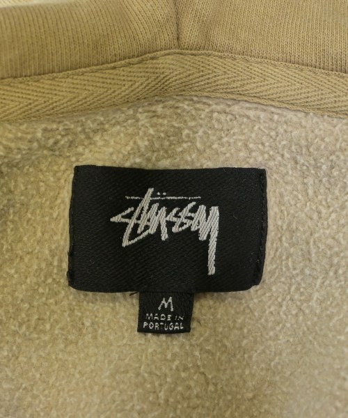 STUSSY（ステューシー）パーカー ベージュ サイズ:M メンズ/2200724111138