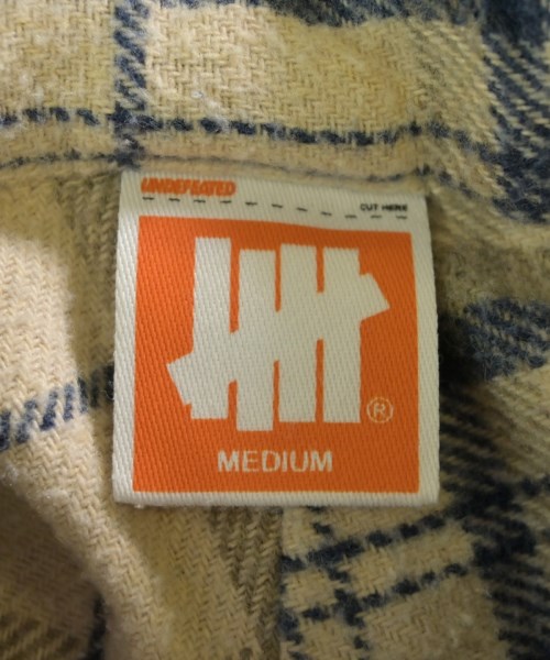 UNDEFEATED（アンディフィーテッド）カジュアルシャツ ベージュ サイズ:M メンズ/2200612678033