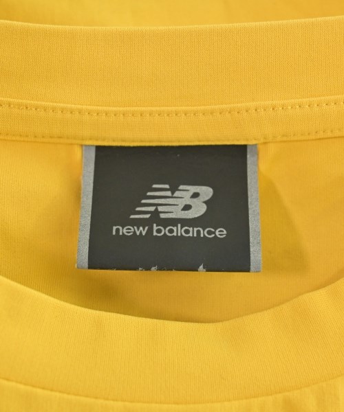 New Balance（ニューバランス）Tシャツ・カットソー 黄 サイズ:M メンズ/2200621724035