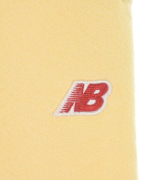 New Balance（ニューバランス）ショートパンツ 黄 サイズ:L メンズ/2200597214080