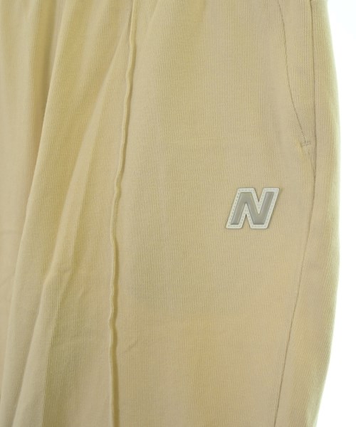New Balance（ニューバランス）スウェットパンツ ベージュ サイズ:M レディース/2200679568025