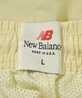 New Balance（ニューバランス）ショートパンツ 黄 サイズ:L メンズ/2200657462093