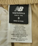 New Balance（ニューバランス）カーゴパンツ ベージュ サイズ:M レディース/2200660665078