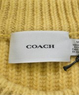 COACH（コーチ）ニット・セーター 黄 サイズ:M レディース/2200678526040