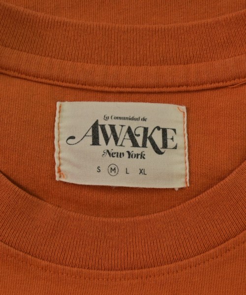 AWAKE（アウェイク）Tシャツ・カットソー オレンジ サイズ:M メンズ/2200657132750